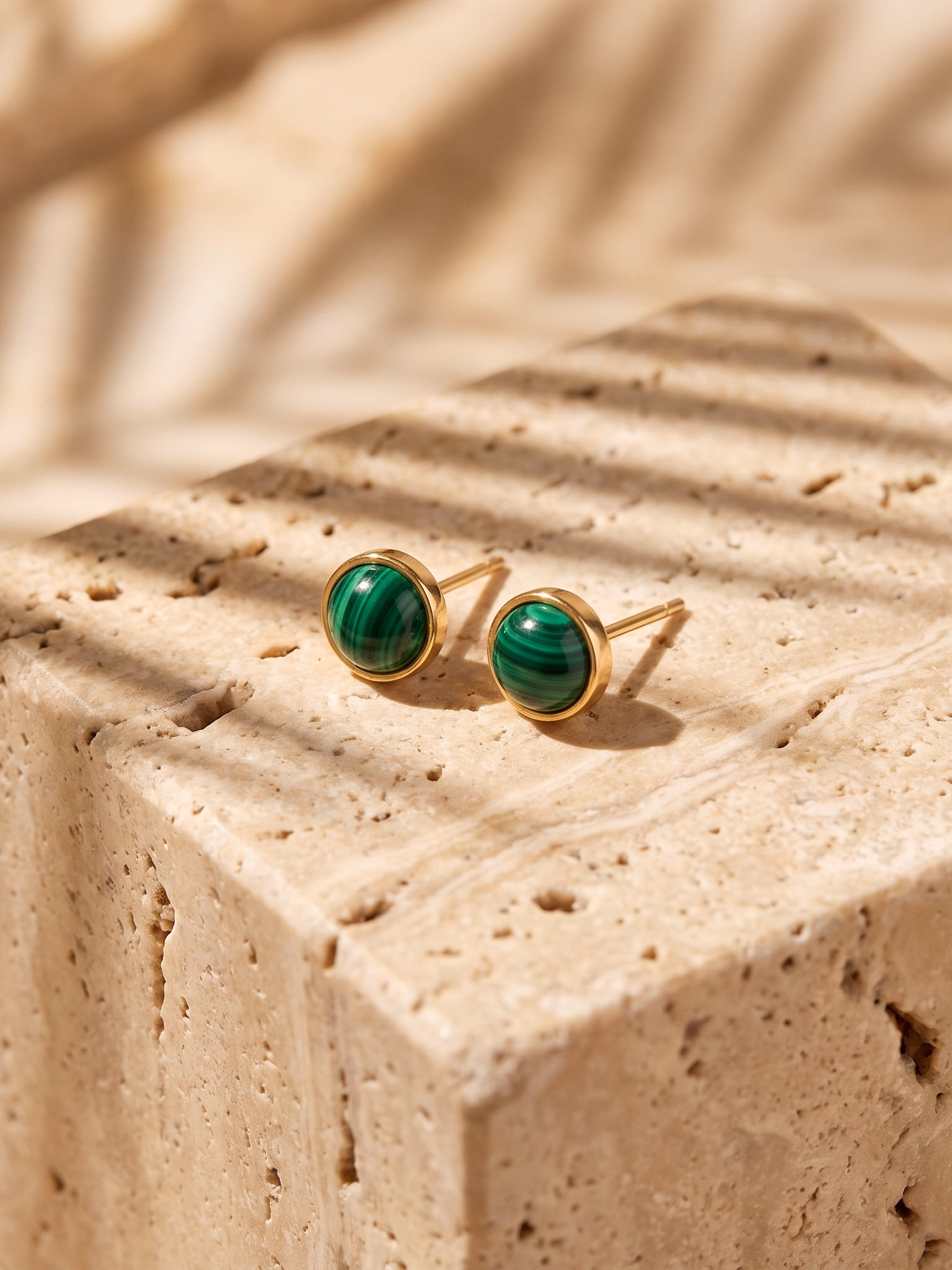 Fine Gold Malachite Stud Earrings — High-magnification gemstone macro capturing authentic mineral band textures and 18K gold claw setting.